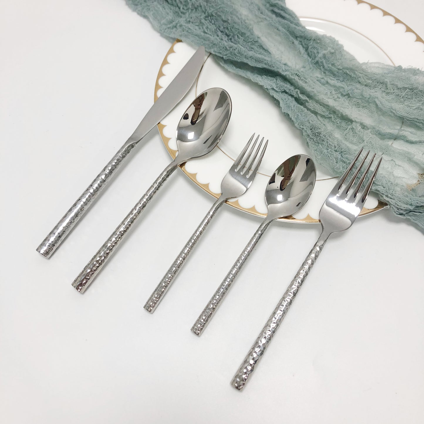 Cutlery with thick hammered handles