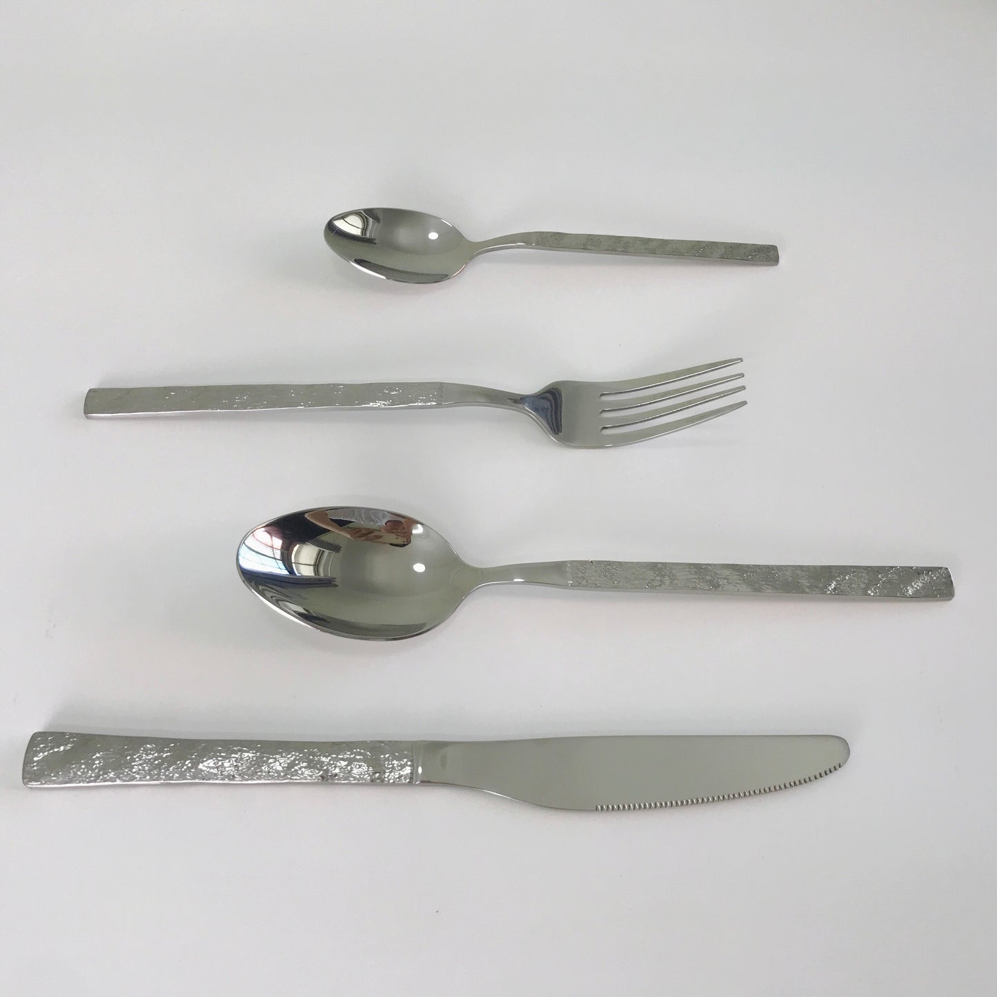 Flatware set with stone texture handle