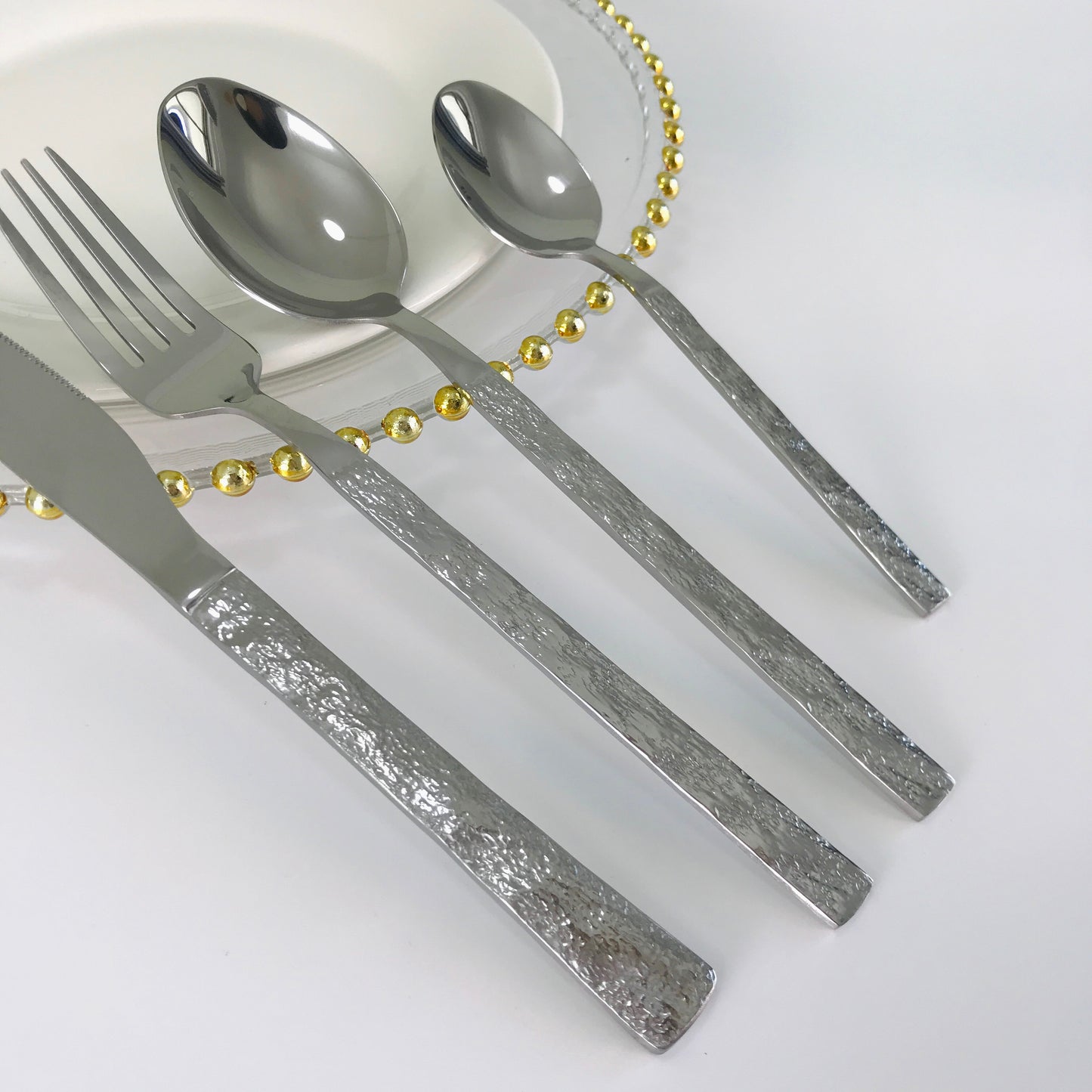 Flatware set with stone texture handle