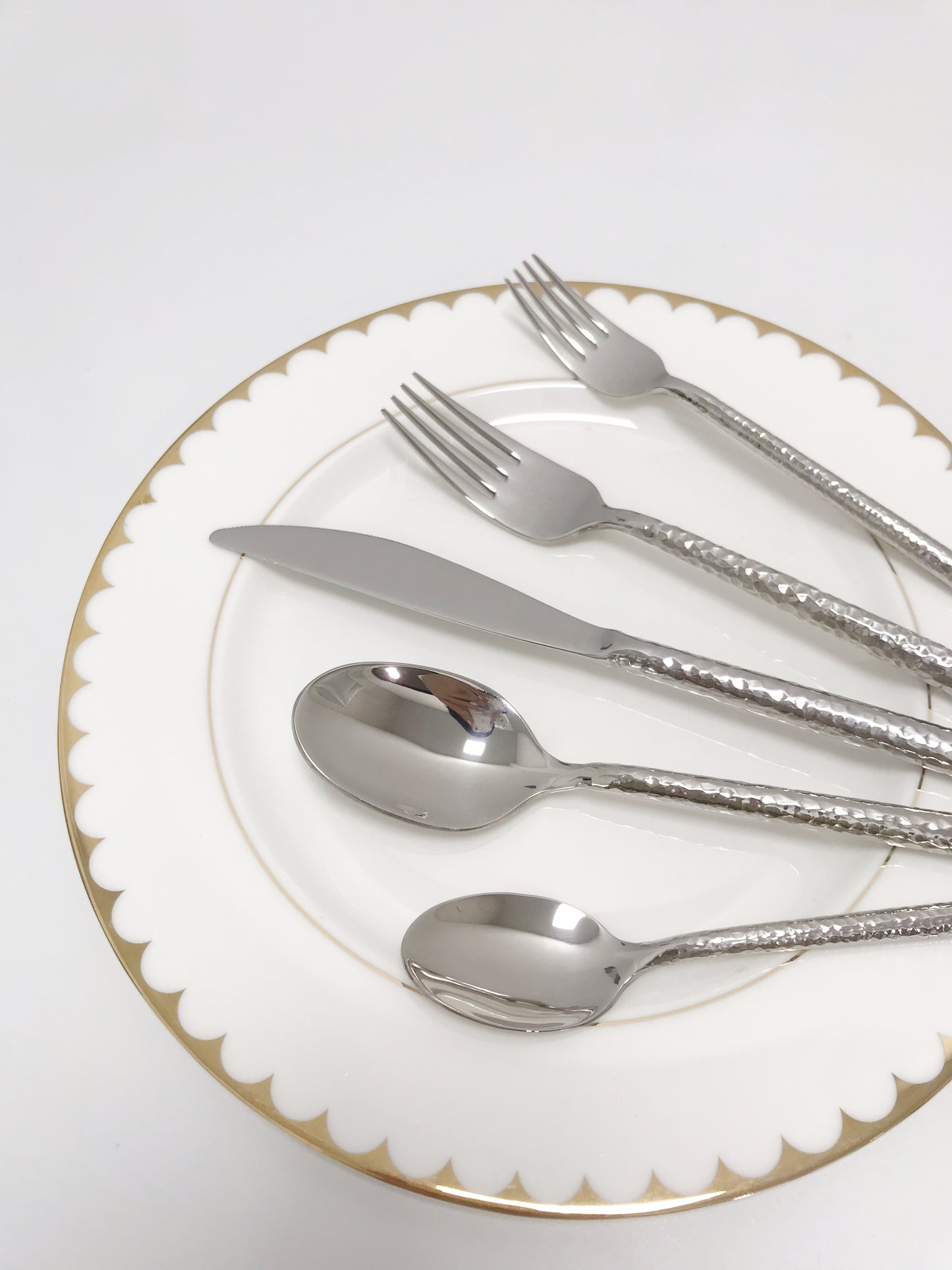 Cutlery with thick hammered handles