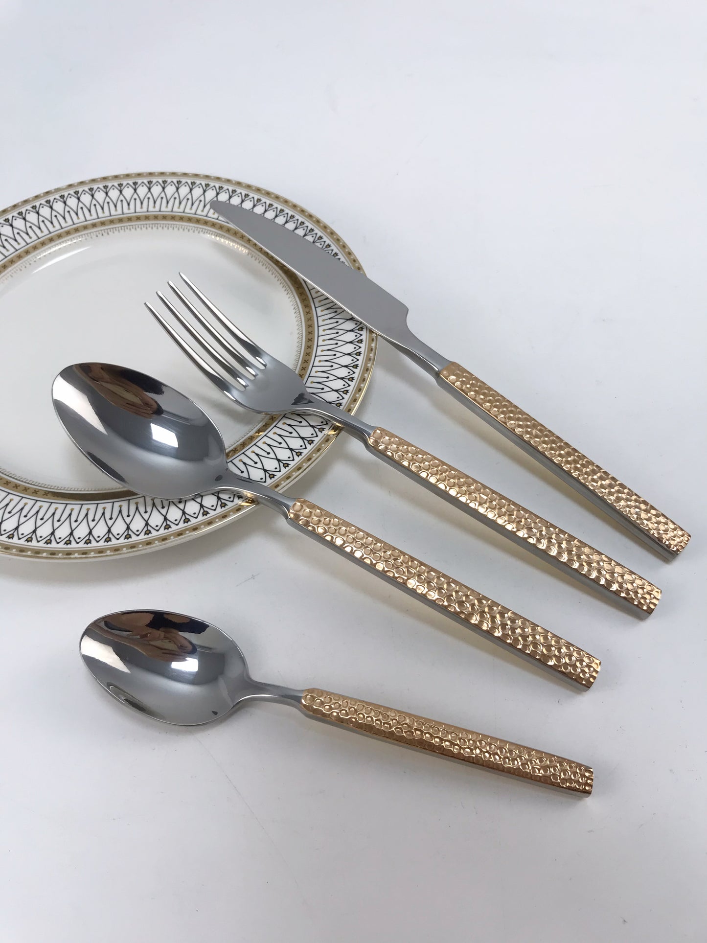 Cutlery with rose gold handle