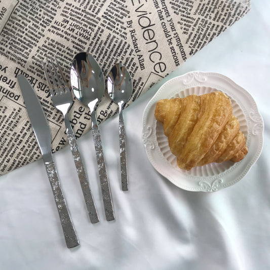 Flatware set with stone texture handle